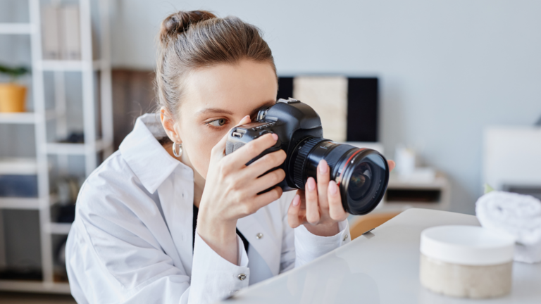Blog 1 woman taking a photo of products with a camera