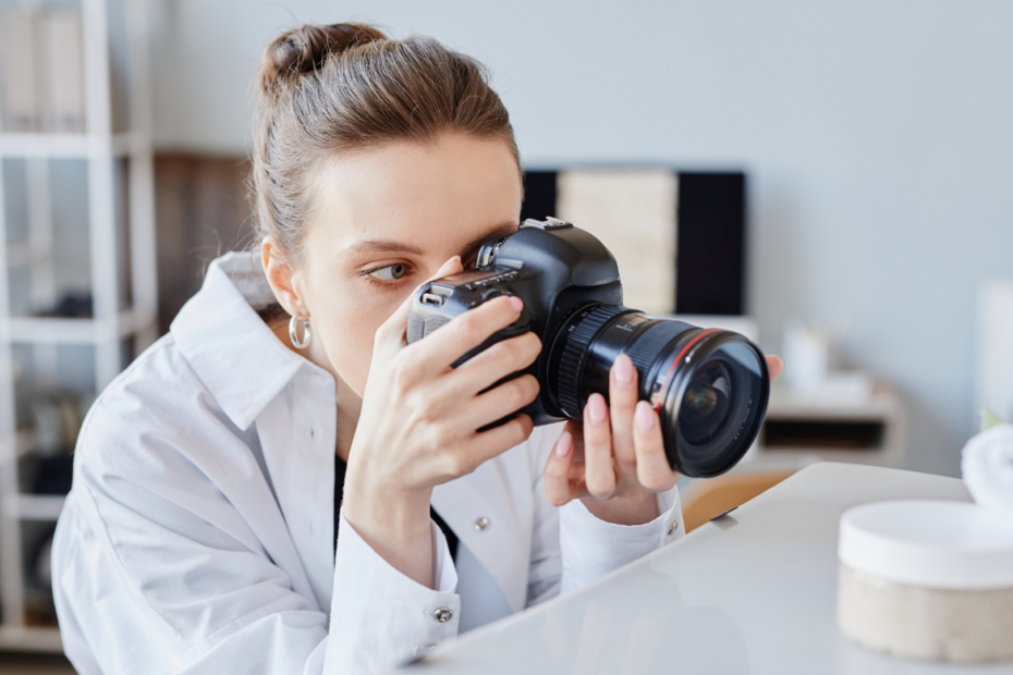 woman taking a photo of products with a camera